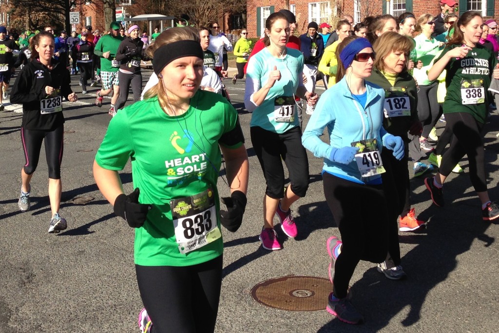 Hope Wilkes and Beth McClain head downhill in the first mile of the Four Courts Four Miler.                Photo: Charlie Ban