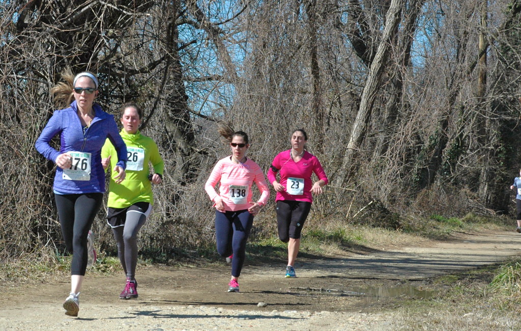 Sue Tate, Jori Beck, Christa Elza and Kelly Bauer finish up the Georgetown 10 Miler on the C&O Canal Towpath March 9. Photo: Jamie Corey