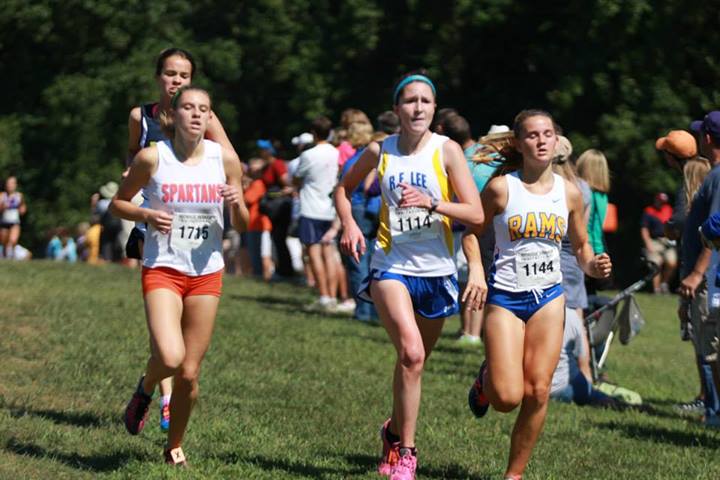 West Springfield's Katie Kennedy, Robert E. Lee's Bailey Kolonich and Robinson's Lauren Berman bust the rust at the Monroe Parker Invitational at Burke Lake Sept. 7. Photo: Ed Lull