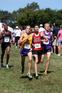 Lake Braddock's Alex Corbett, James Madison's Matt Callem and Chantilly's Dakota Lange try to maintain their gap on Battlefield's Aaron Hill. Photo: Ed Lull