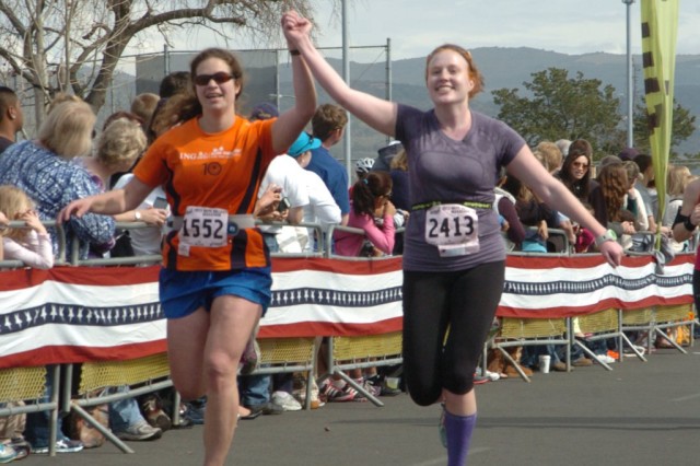 Alana Miller (left) and Ashley Vaughan near the finish line of the 2013 Napa Marathon. Photo: MarathonFoto