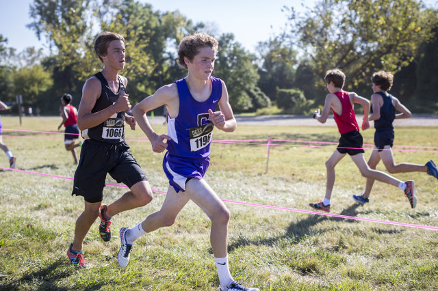 Gonzaga's John Colucci leads Ryan Lockett of Poolesville in the freshman boys' race at the DCXC Invitational. Photo: Dustin Whitlow