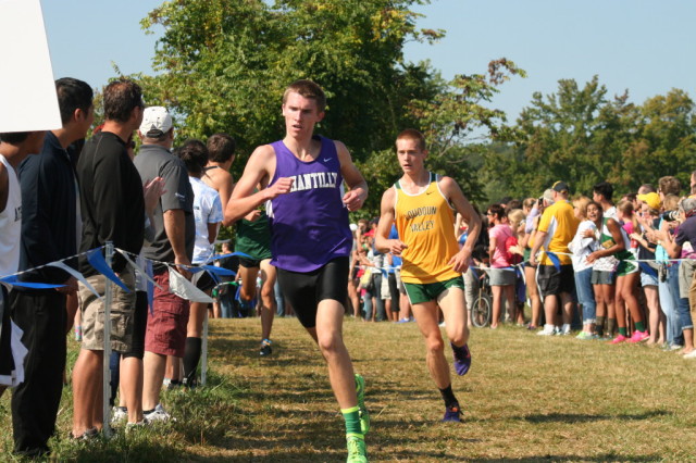 Chantilly's Ryan McGorty leads Loudoun Valley junior Andrew Hunter in the second mile at the Oatlands Invitational. Photo: Charlie Ban