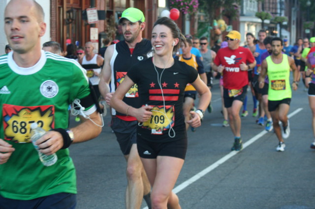 Jilanne Doom's expression is one of hope and joy as she approaches the turn to the five mile mark. The Washington, D.C. resident finished in 3:19:12. Photo: Charlie Ban