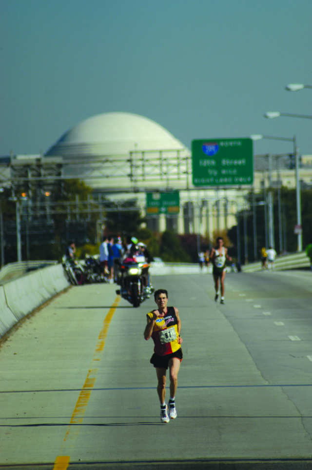 Carl Rundell leads Ruben Garcia across the 14th Street Bridge during the 2005 Marine Corps Marathon. Garcia would go on to win in 2:21:18, eight seconds ahead of Rundell. Photo: Courtesy of the Marine Corps Marathon via Steve Nearman, author of Marine Corps Marathon: An Epic Journey in Photographs 