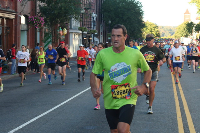 David Rehm, of Fayetteville, Ga. bears down on the challenging 21 miles ahead as he nears the five mile mark. He finished in 3:59:01. Photo: Charlie Ban