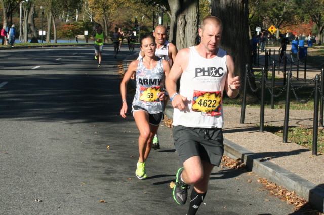 Army. Capt. Meghan Curran, in second place at the Marine Corps Marathon. She would go on to take the lead a mile later and hold on to win her first marathon. Photo: Charlie Ban