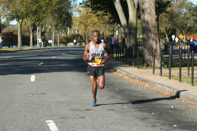 Marine Corps Marathon winner Samuel Kosgei nearing the 17 mile mark in second place. Photo: Charlie Ban