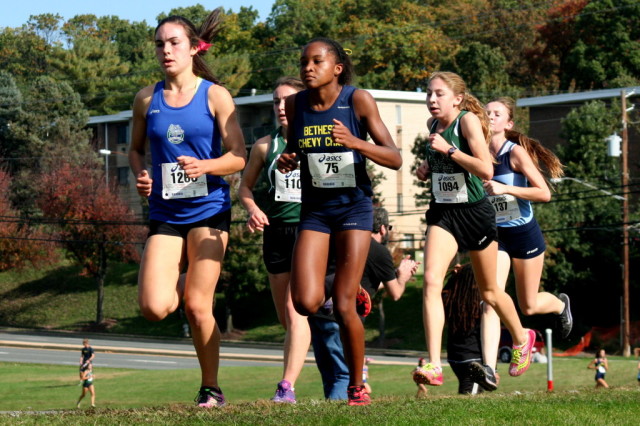 Lucy Srour, Nora McUmber and Abbey Green lead the front pack at the Montgomery County Cross Country Championships. Photo: Charlie Ban