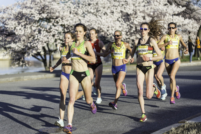 Silver Spring resident Lindsay Flanagan leads a chase back of elite women on the Cherry Blossom course Sunday. Photo: Dustin Whitlow/D. Whit Photography