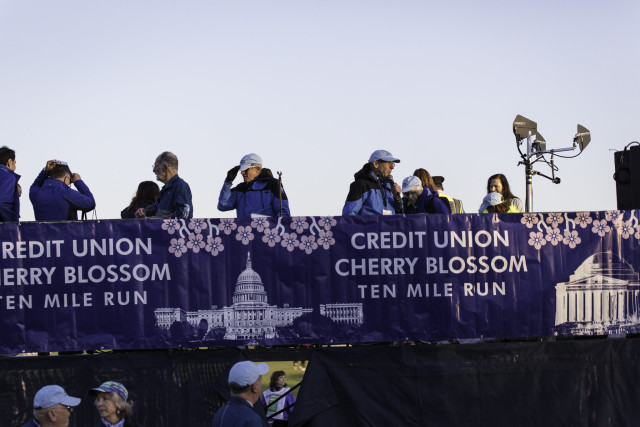 Cherry Blossom Race Director Phil Stewart, holding the microphone, before the start of this year's race. Photo: Dustin Whitlow/D. Whit Photography