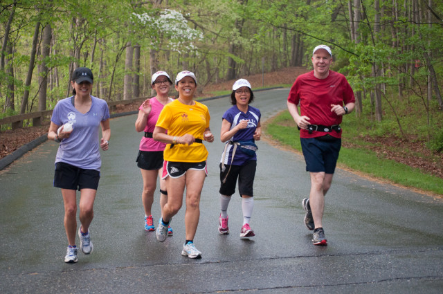 Joe Divel (right) runs through Lake Needwood Park during a First Time Marathoners practice. Photo: Hai D. Nguyen