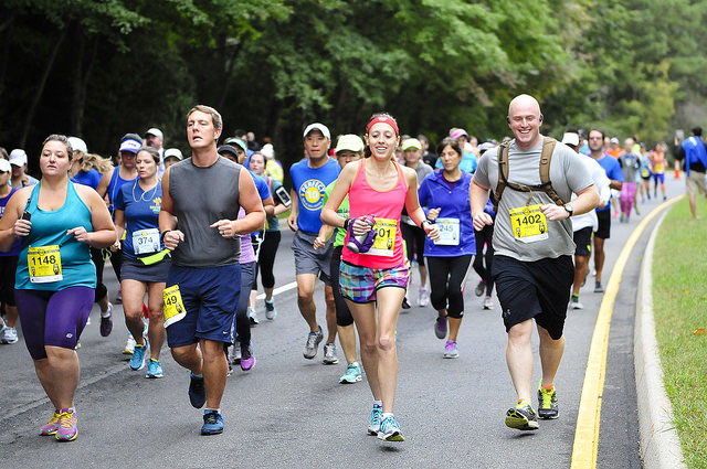 Christine McCauley (in pink) and Ian McLallen (with backback) start off the 10 mile portion of the Perfect 10. Photo: Potomac River Running