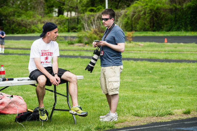 Kevin Milsted (standing) chats with Albert Einstein coach Eric DaSilva. Photo: Marleen Van den Neste