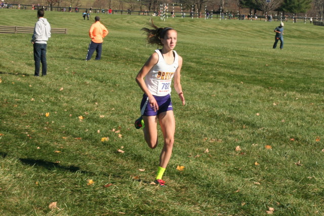 Kate Murphy cruises in for her first cross country state title, in the 6A division. Photo: Charlie Ban
