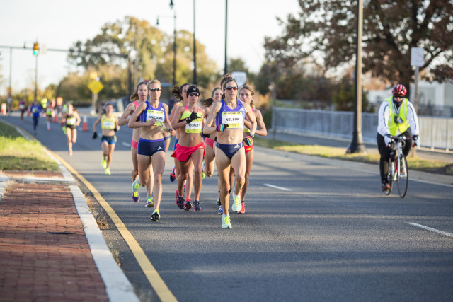 Brianne Nelson leads the pack that chased after Molly Huddle. Nelson finished fifth. Photo: Dustin Whitlow/ D. Whit Photography