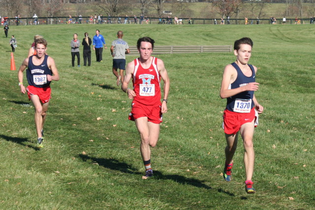 Thomas Jefferson's Dylan Klapper and Nathan Riopelle flank George Marshall's Alex Haight during the 5A boys race. Photo: Charlie Ban