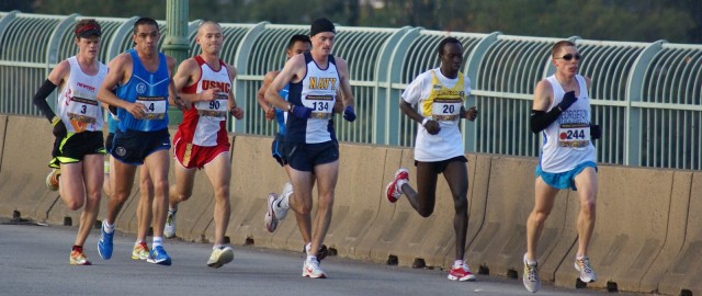 Ian Hankins leads a group over the Key Bridge during the 2010 Marine Corps Marathon. Photo; Cheryl Young