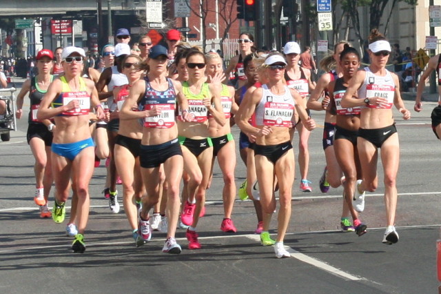 Lindsay Flanagan (center, in sunglasses) races in the lead pack during mile three of the U.S. Olympic Marathon Trials. Photo: Charlie Ban