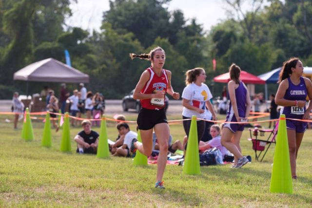 Heather Holt has the DCXC Invitational course to herself during the junior race, during which she set the meet record in 16:56 for 3.07 miles. Photo: Dustin Whitlow/DWhit Photography