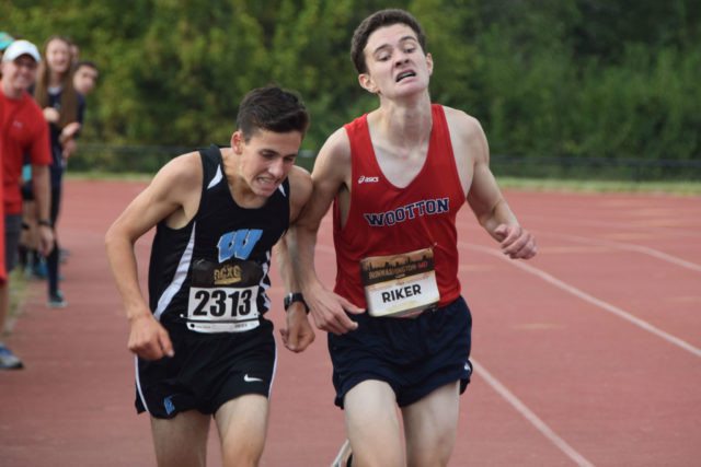 Walt Whitman's Aaron Bratt edged T.S.Wootton's John RIker for the DCXC Invitational sophomore class title. Photo: Charlie Ban