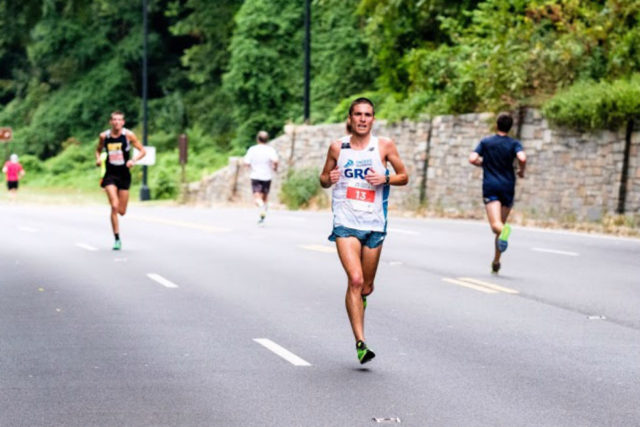 Bethesda native Daniel Samet leads the way in his half marathon debut at the Navy-Air Force Half Sept. 18. Photo: Dustin Whitlow/DWhit Photography