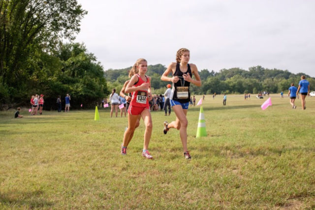 Ava Hassebrock leads Caroline Howley and Nandini Satsangi (obscured) during the DCXC Invitational sophomore race. Photo: Dustin Whitlow/DWhit Photography