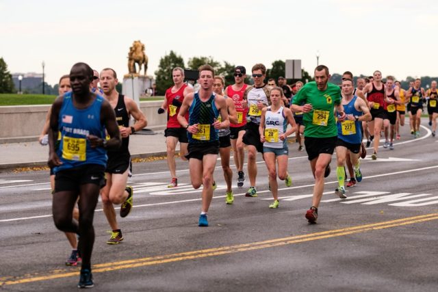 Stephanie Riech navigates the crowd nearing the second mile mark at the Army Ten-Miler. Photo: Dustin Whitlow/DWhit Photography