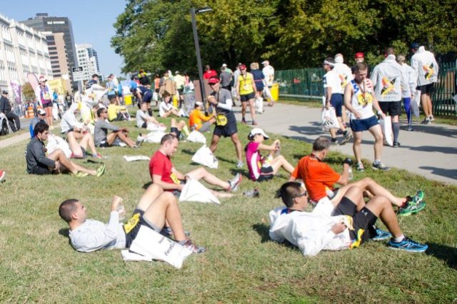 Marine Corps Marathon runners relax and convalesce after the race. Photo: Jimmy Daly