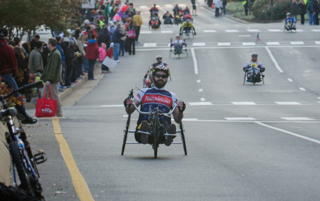Hand-crank cyclists lead off the 2013 Marine Corps Marathon. Photo: Jimmy Daly
