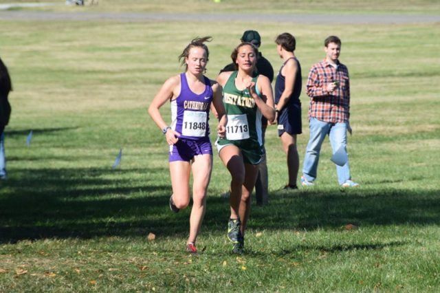 Page Lester leads Megan Lynch at the D.C. state meet. Photo: Charlie Ban
