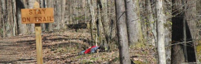 John Kelly sleeping within view of the Barkley Marathons camp in 2016. Photo: