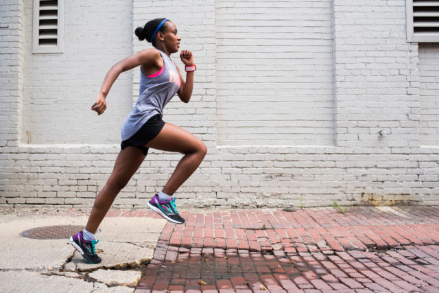 McKinley Tech High Schooler, Ruth Tesfai, runs through the streets of DC to train for her cross country competitions. Photography by Joy Asico