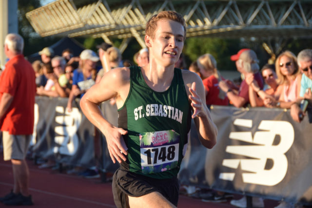 Caleb McCurdy closes in on the finish line during the senior boys' race. Photo: Charlie Ban