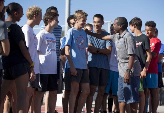 Darrell General with the George Marshall cross country team. Photo: Doug Stroud 