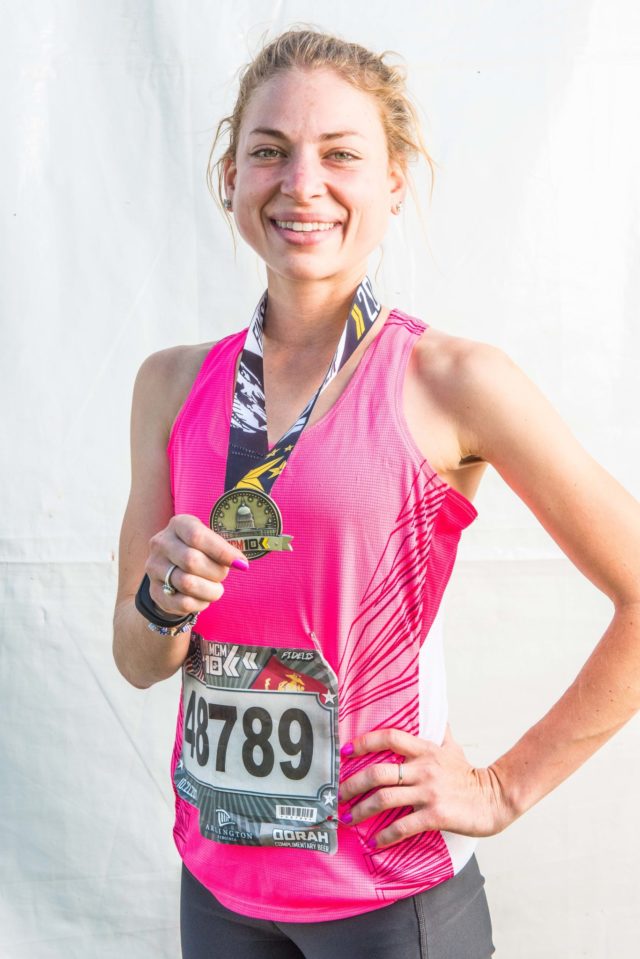 Photo By Doug Stroud Bethany Sachtleben of Alexandria, VA blazed the Marine Corps Marathon 10K, not only taking first place for women but set a new a course record of 34:07. Picking up running later in life, Bethany 25 years of age did not start running until after high school, said, "I used this race as prep for the Richmond Marathon".